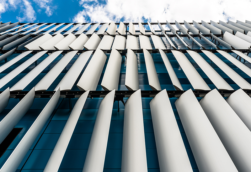 opp-cred-per.jpg building facade with panels